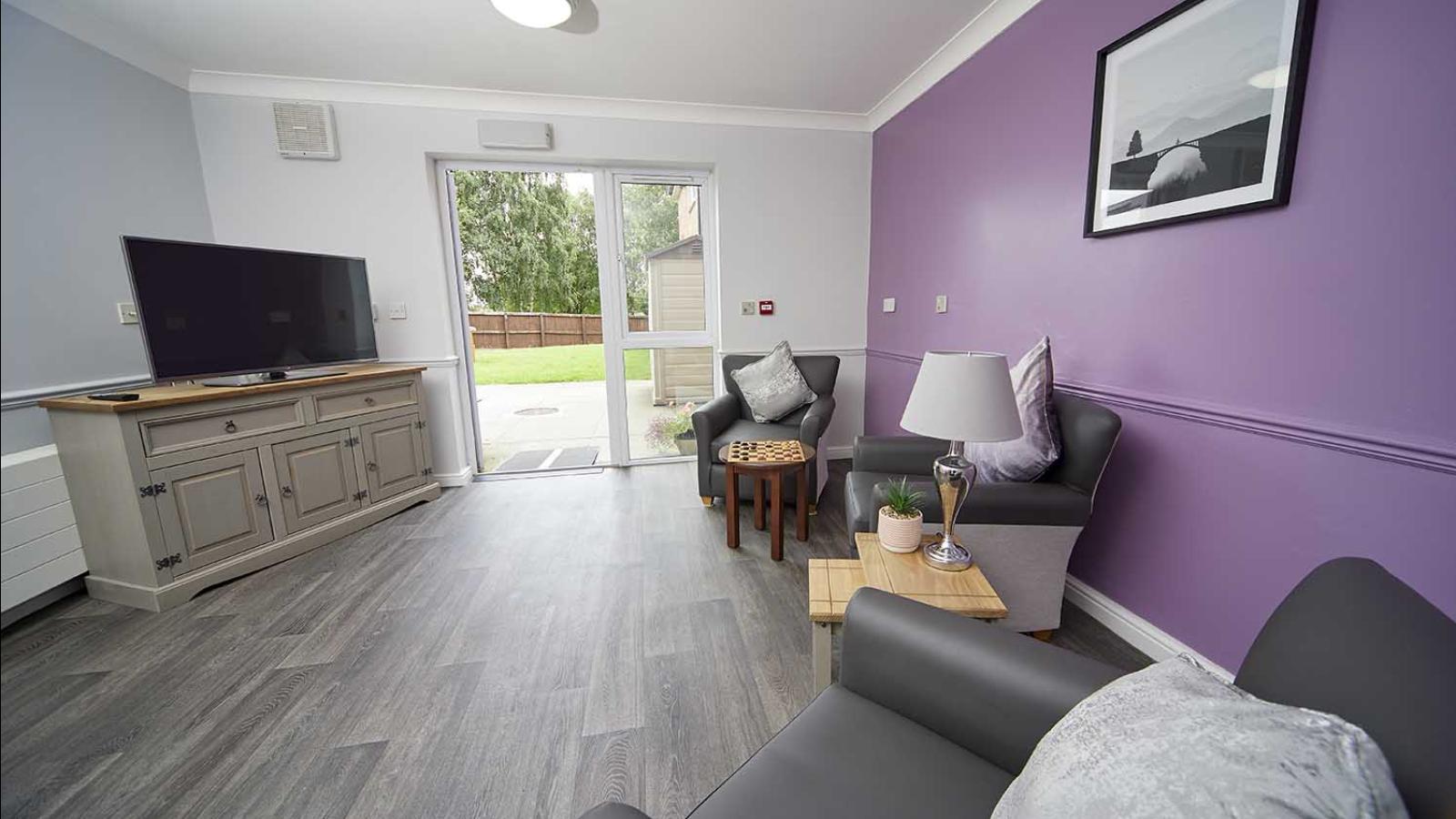 Large lounge area with TV