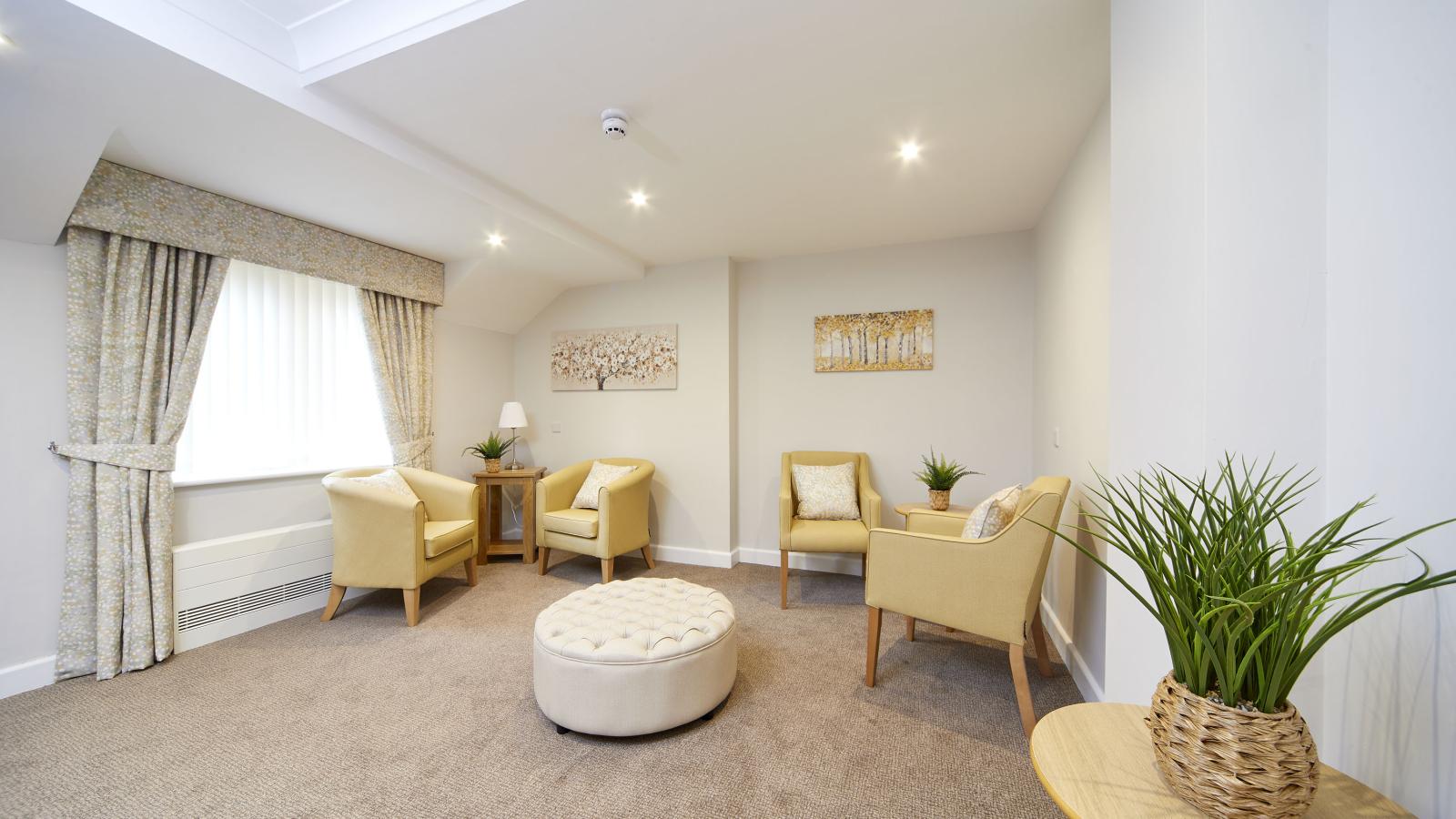 Care home lounge with tub chairs 