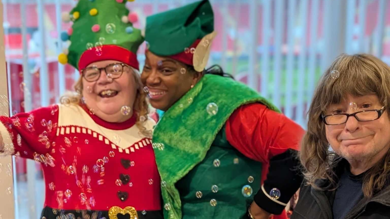 Three women in Christmas fancy dress