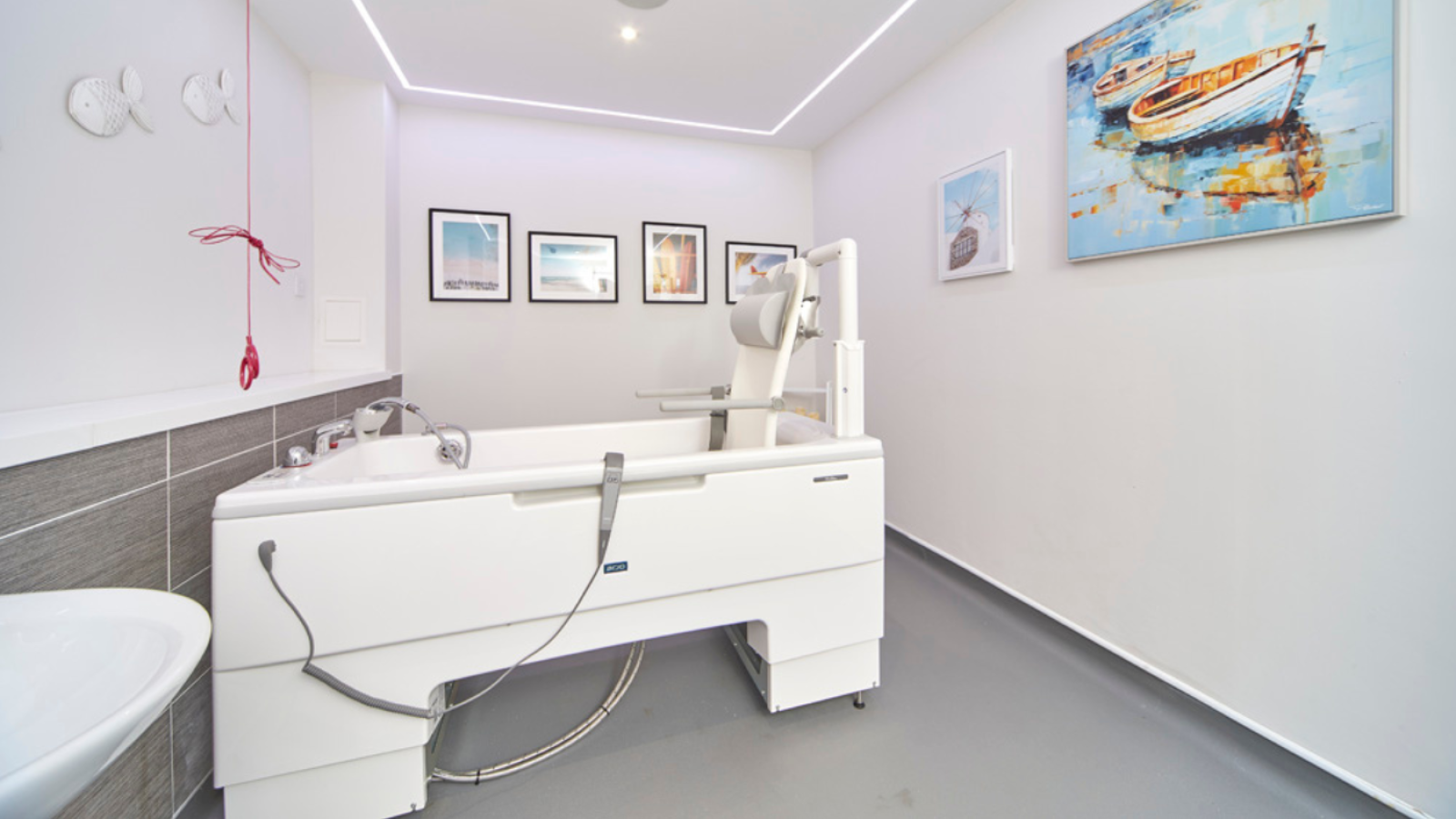 A photo of a bathroom with a large bath