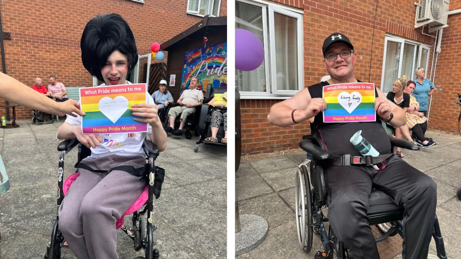 Two people in wheelchairs holding a Pride sign