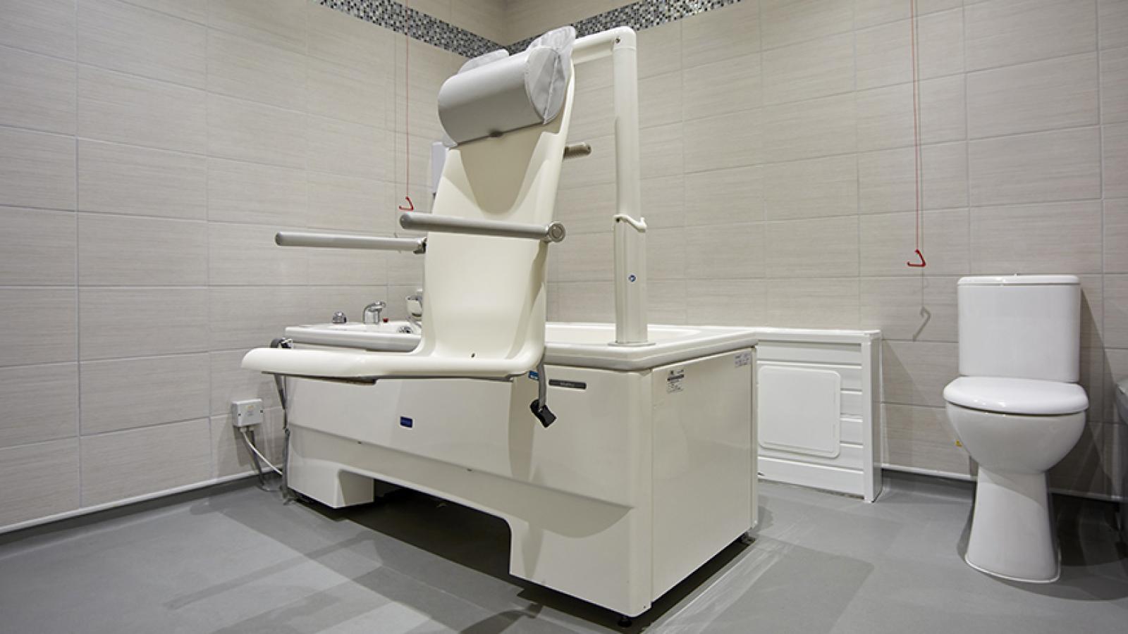 Accessible bath in a bathroom