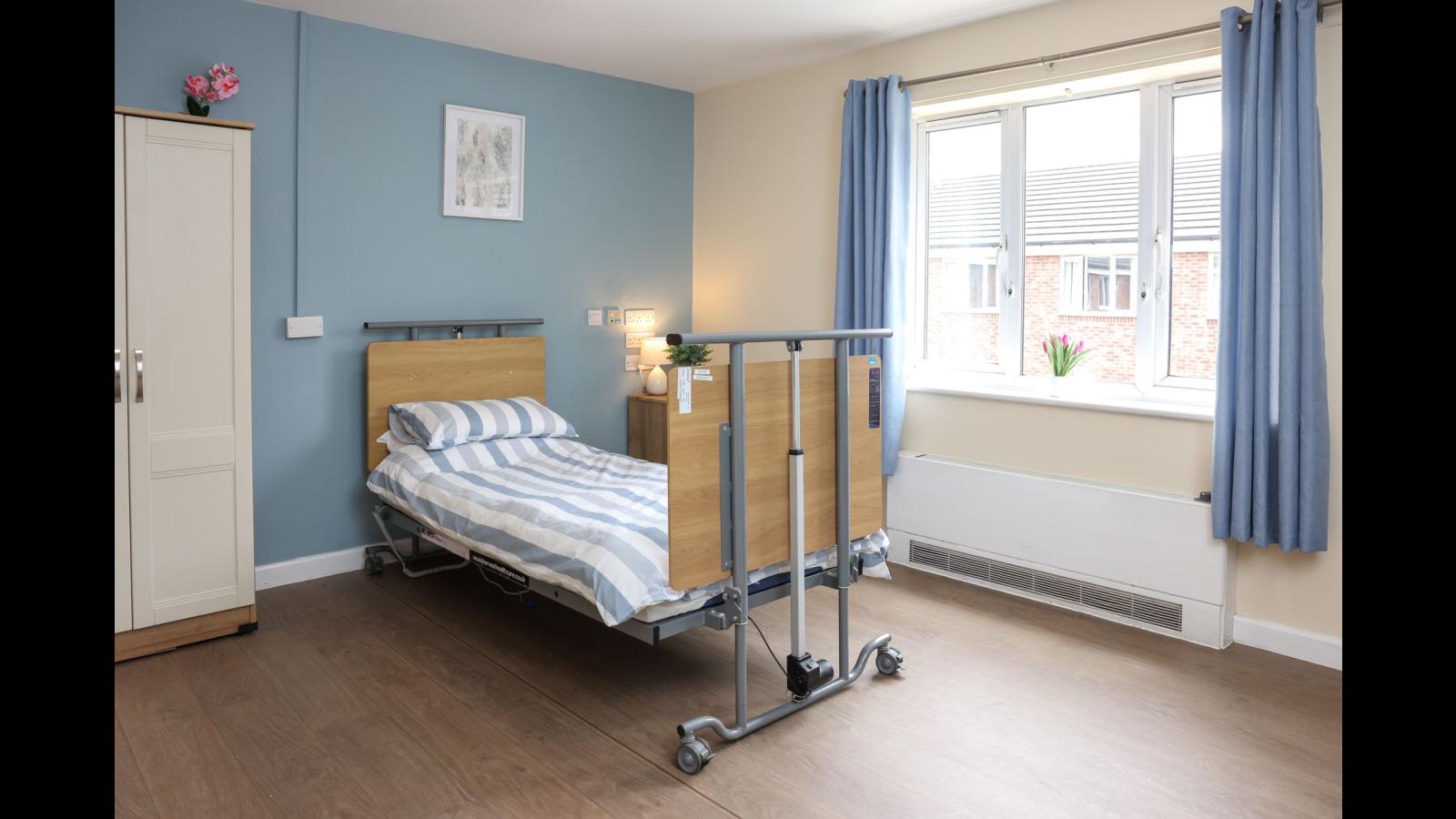 Bedroom with bed and wardrobe