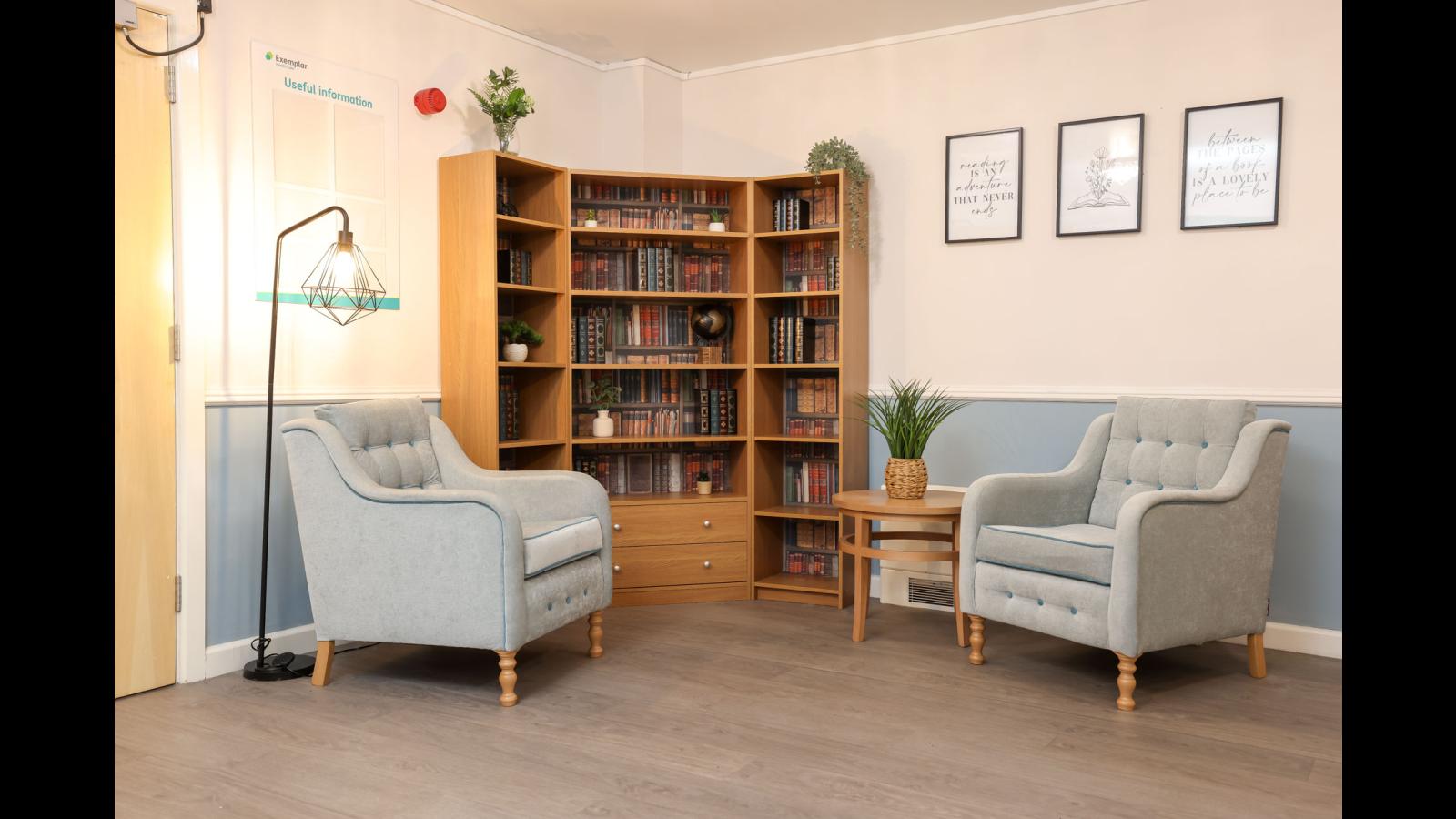 Corner with shelves and two chairs
